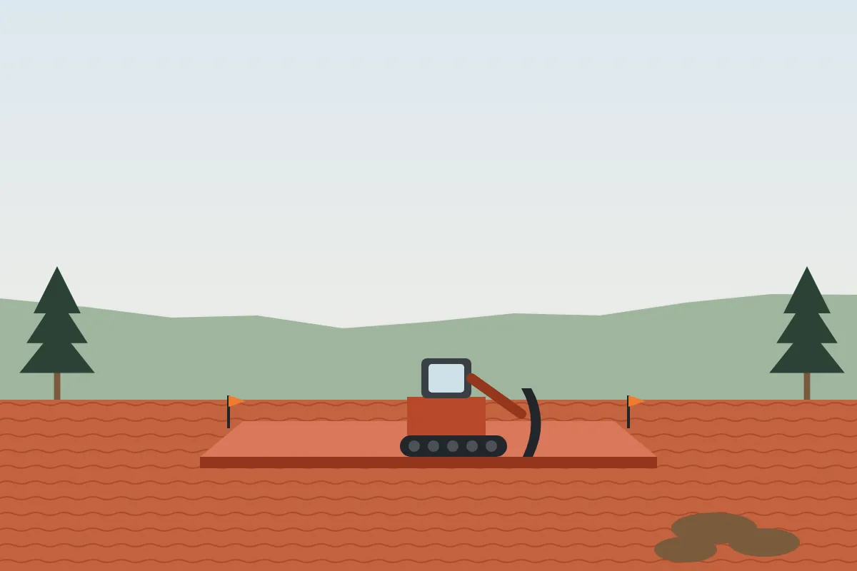 A small dozer shaping red clay into a level house pad with grade stakes